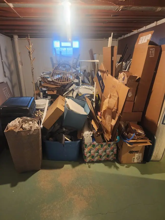 Roll-off dumpster container at job site for 2 Yard Dumpster Rental in River Vale